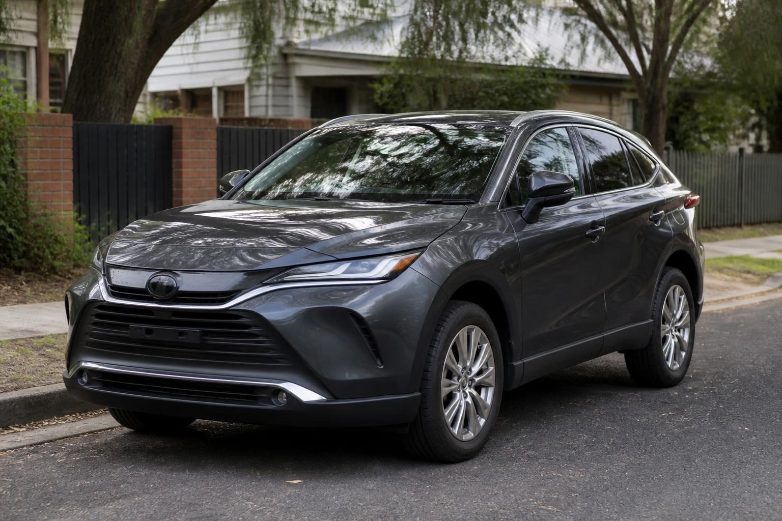 2023 Toyota Harrier AXUH85 hybrid SUV in black, front three-quarter view