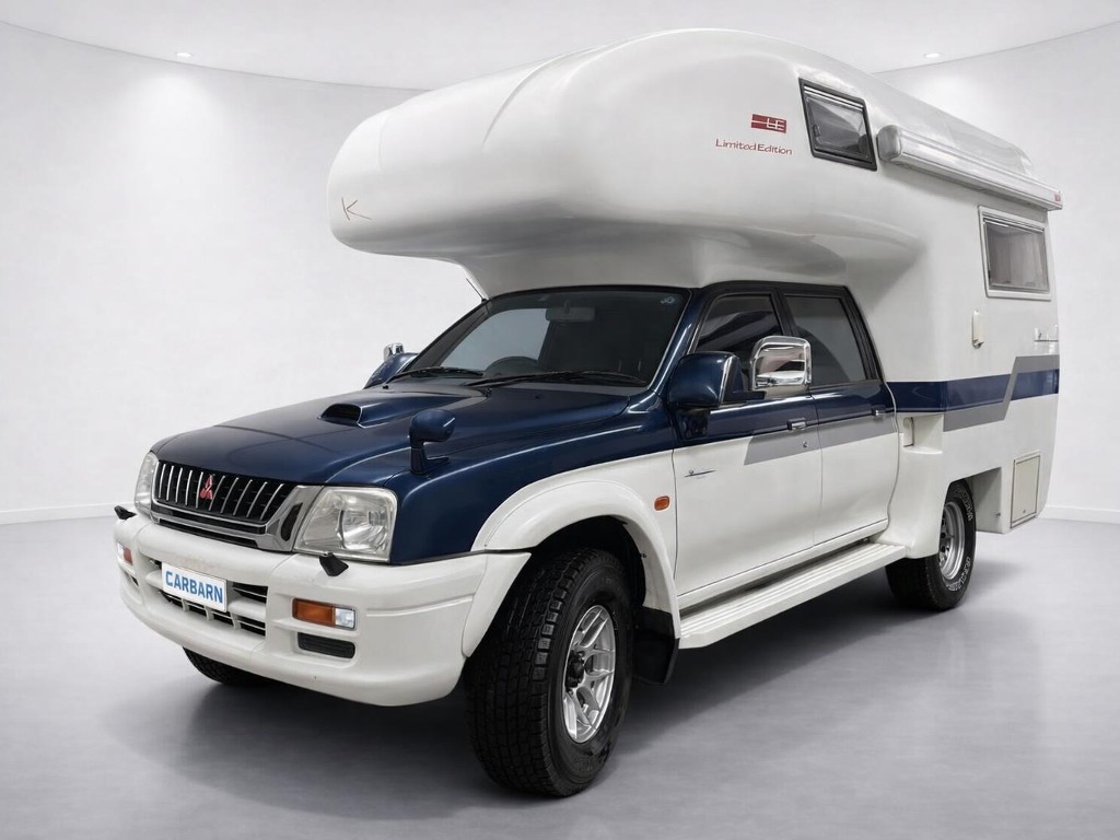 1999 Mitsubishi Strada 4WD side exterior photo 2