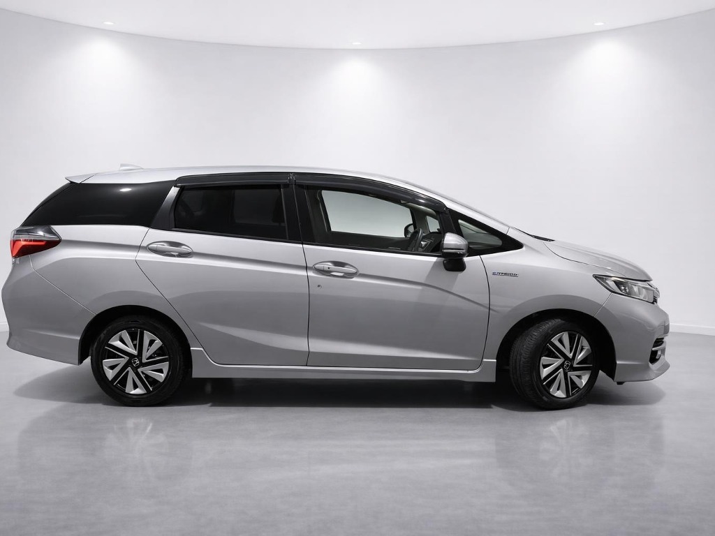 2020 Honda Shuttle Hybrid Honda Sensing side exterior photo 2
